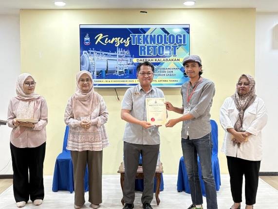 Certificate presentation at a company training programme